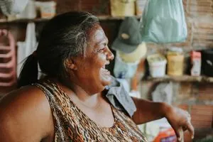 A woman in her fifties laughing
